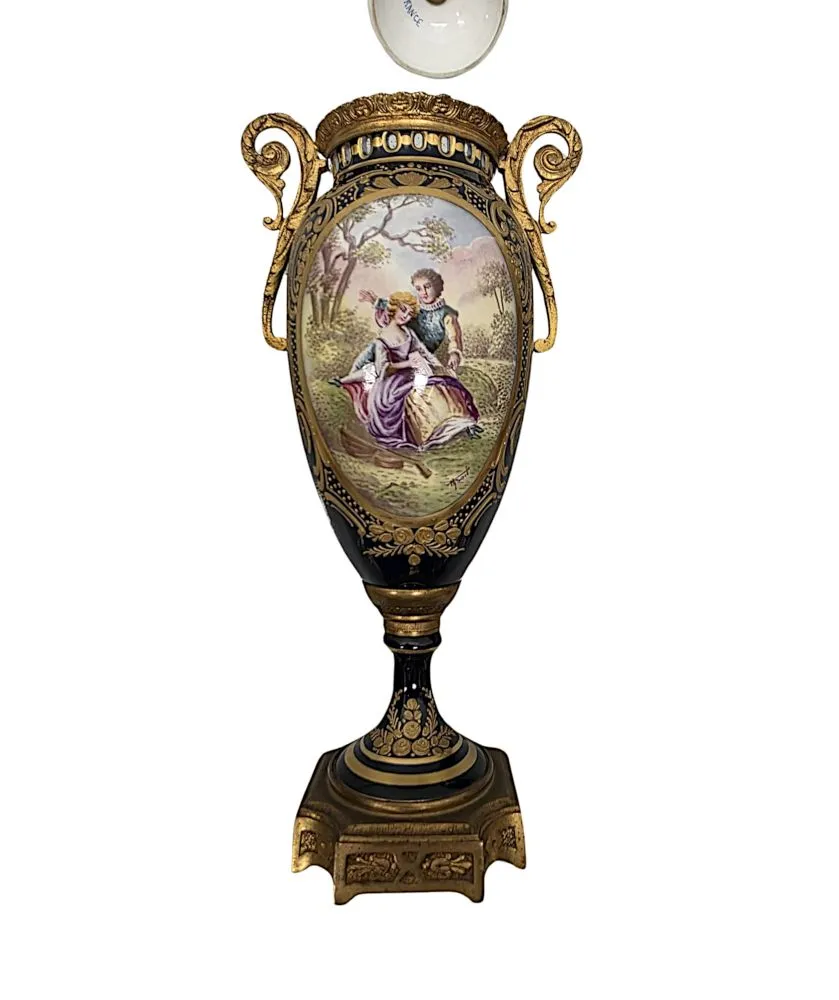  A Very Fine Pair of 19th Century Hand Painted Sevres Style Lidded Urns