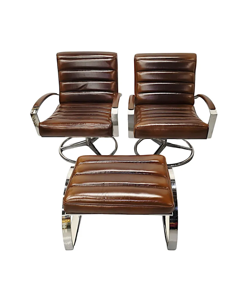  A Stunning Mid Century Style Leather and Chrome Revolving Armchair