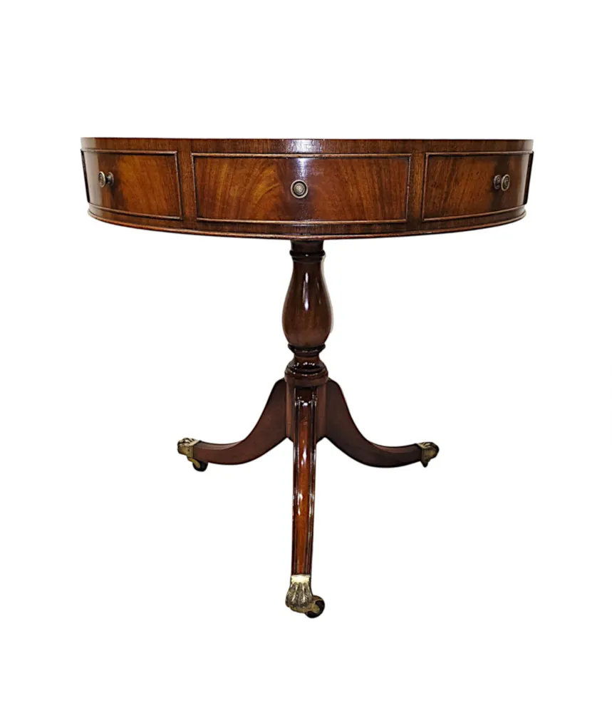 A Stunning Early 20th Century Leather Top Revolving Drum Table