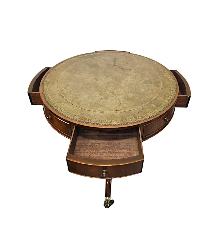 A Stunning Early 20th Century Leather Top Revolving Drum Table