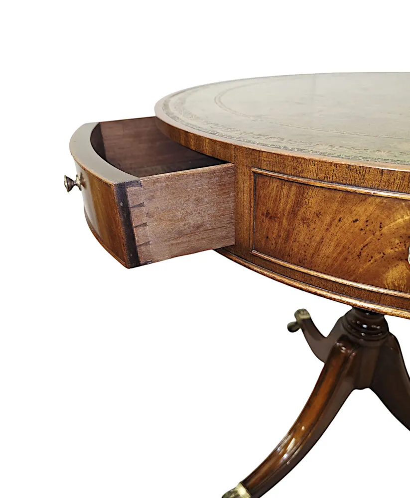 A Stunning Early 20th Century Leather Top Revolving Drum Table