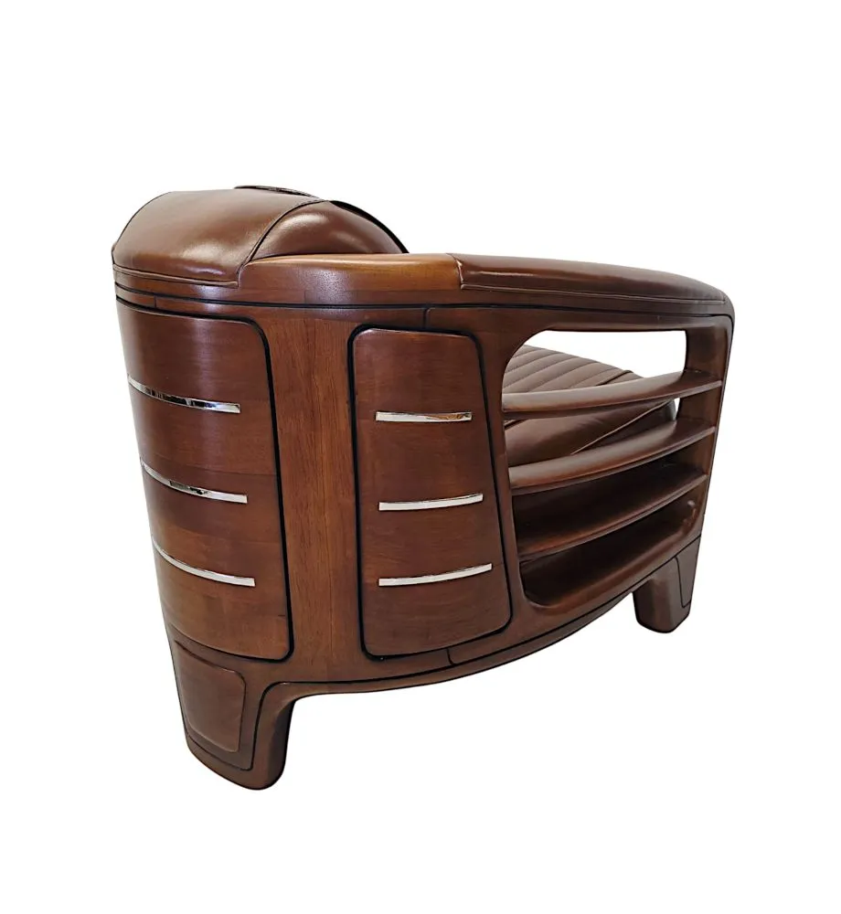 A Very Fine Art Deco Design Walnut and Leather Club Armchair
