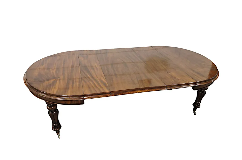 A Fabulous 19th Century Dining Table with Three Extra Leaves 