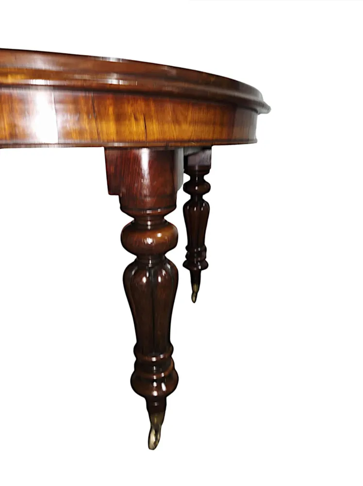 A Fabulous 19th Century Dining Table with Three Extra Leaves 