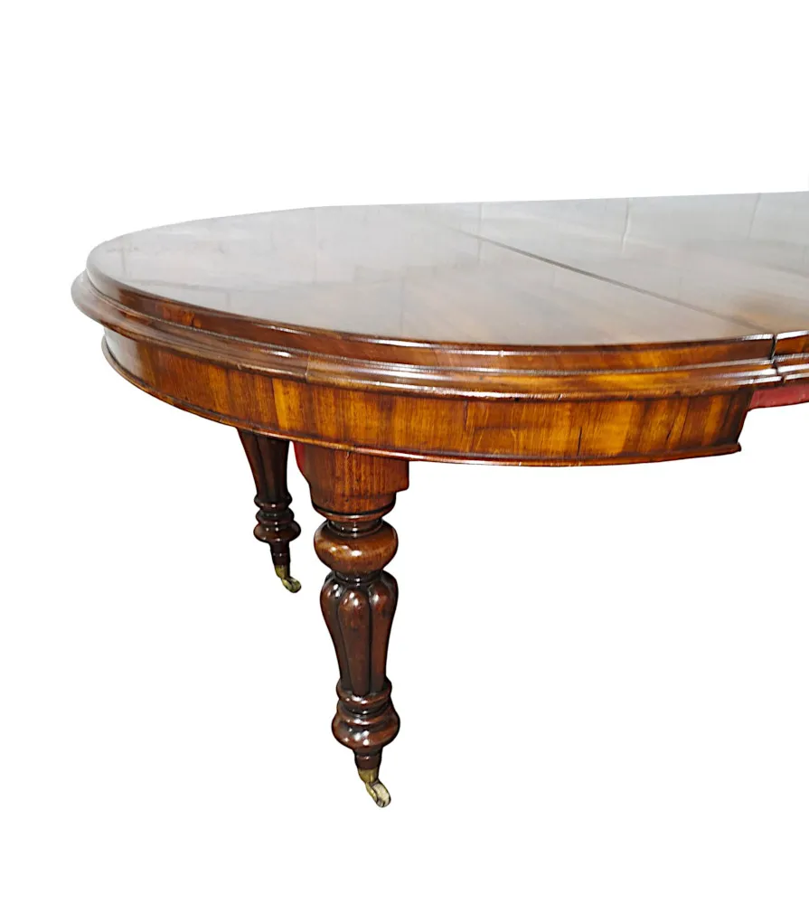 A Fabulous 19th Century Dining Table with Three Extra Leaves 