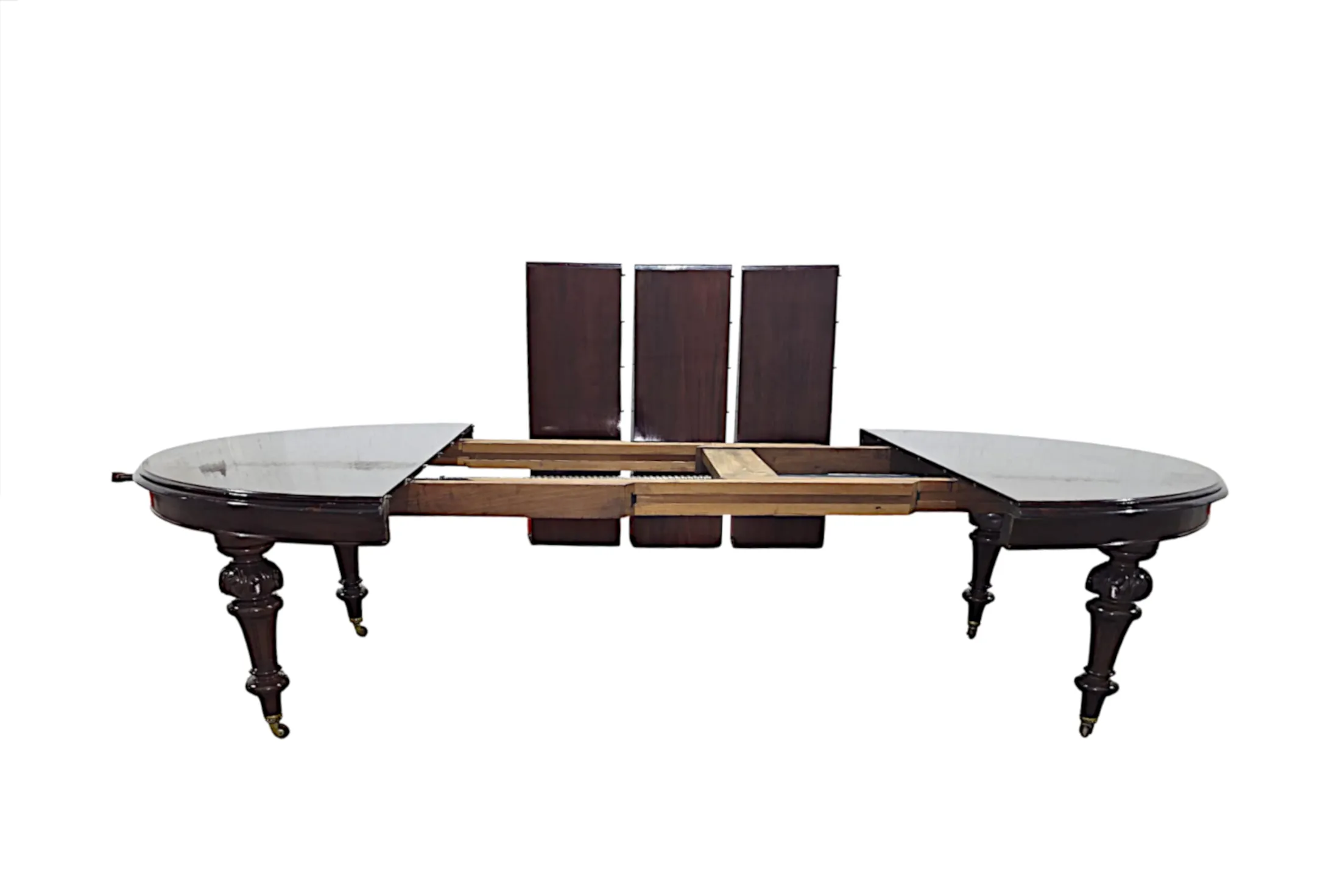 A Very Fine 19th Century Irish D-End Dining Table with Three Extra Leaves in the Manner of Williams and Gibton Dublin