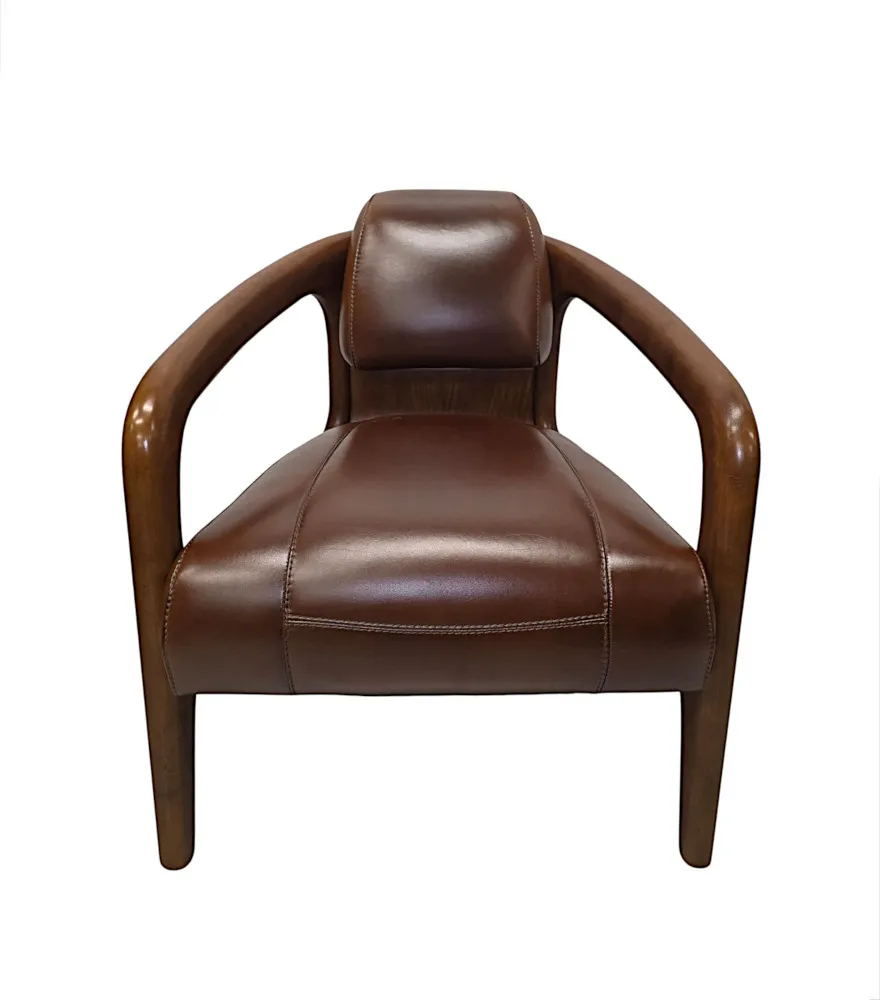 A Fabulous Mid Century Design Walnut and Leather Armchair