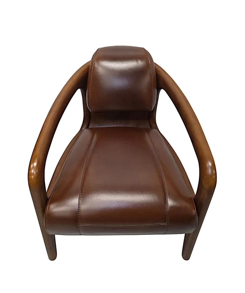 A Fabulous Mid Century Design Walnut and Leather Armchair